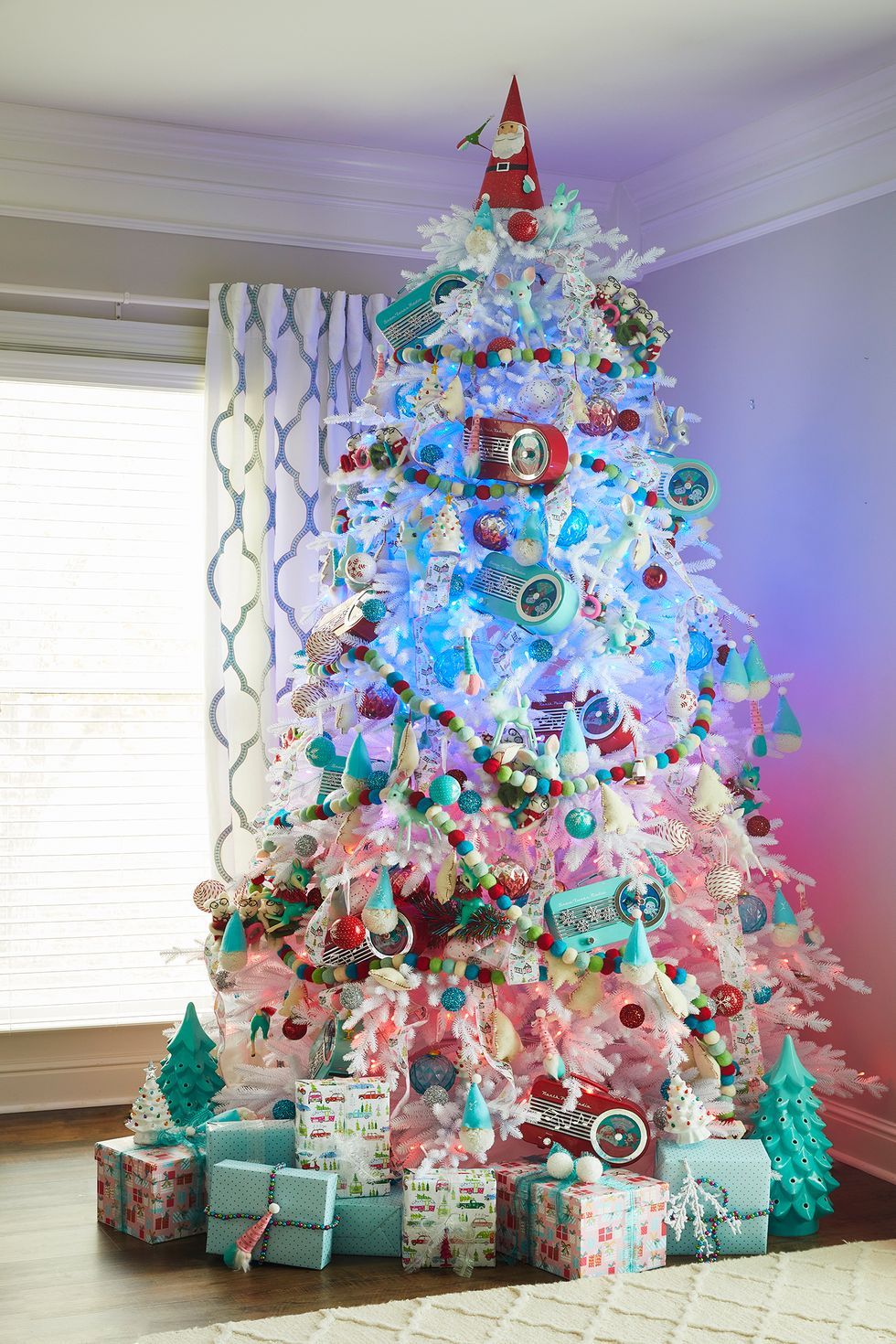 A Feathery Pink Christmas Tree Blue Ornaments