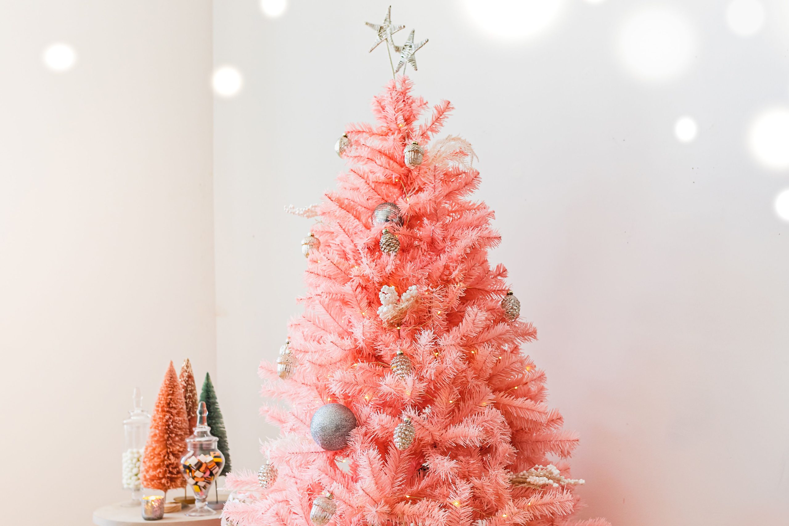 Pink Tinsel Tree With Red and White Ornaments
