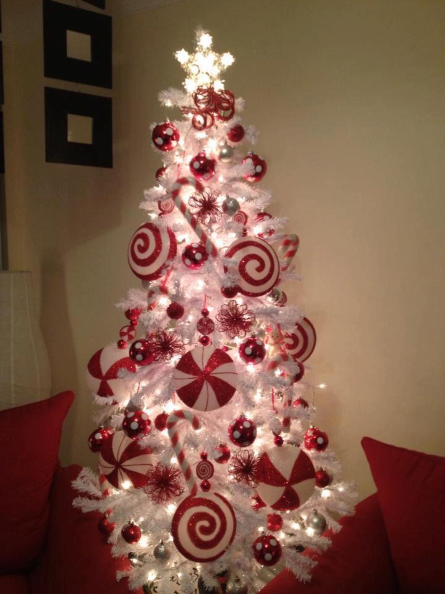 Pink Tinsel Tree With Red and White Ornaments